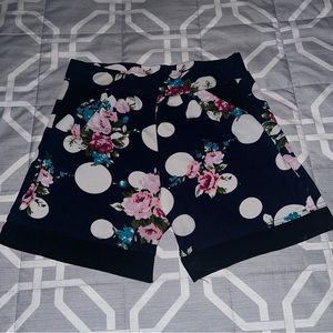 Navy pink floral shorts size medium can fit a small
